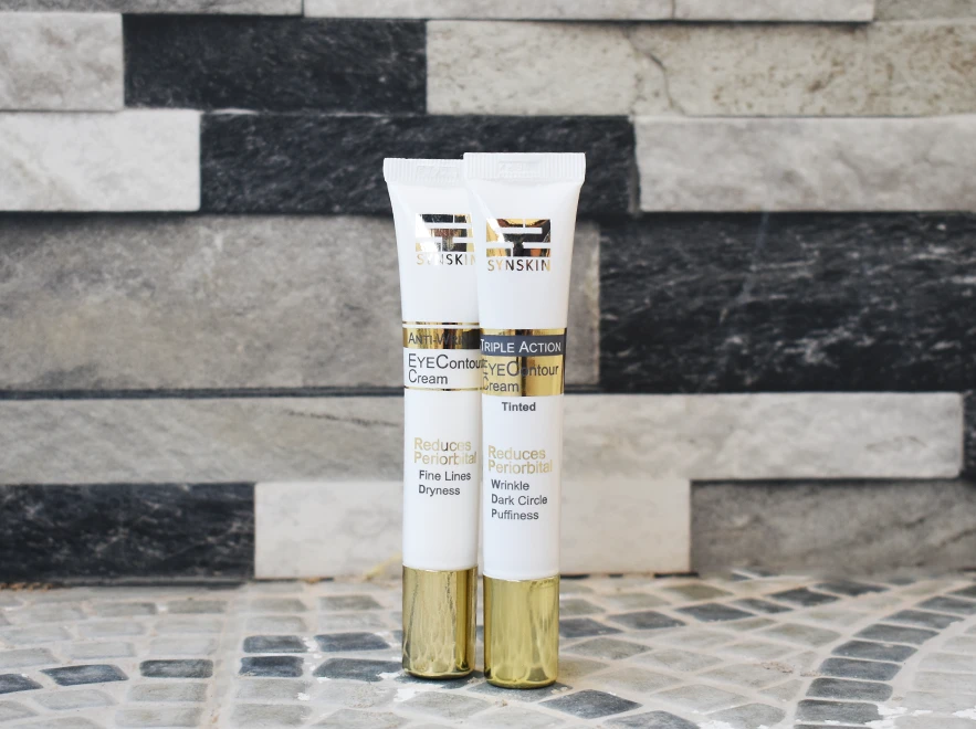 نقد و بررسی کرم دور چشم سه کاره رنگی ساین اسکین حجم 20 میلی لیتر