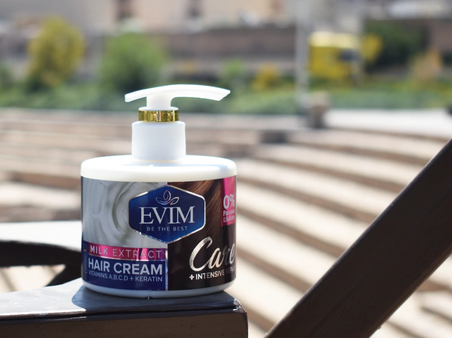 نقد کرم مو عصاره شیر ایویم حجم 250 میلی لیتر